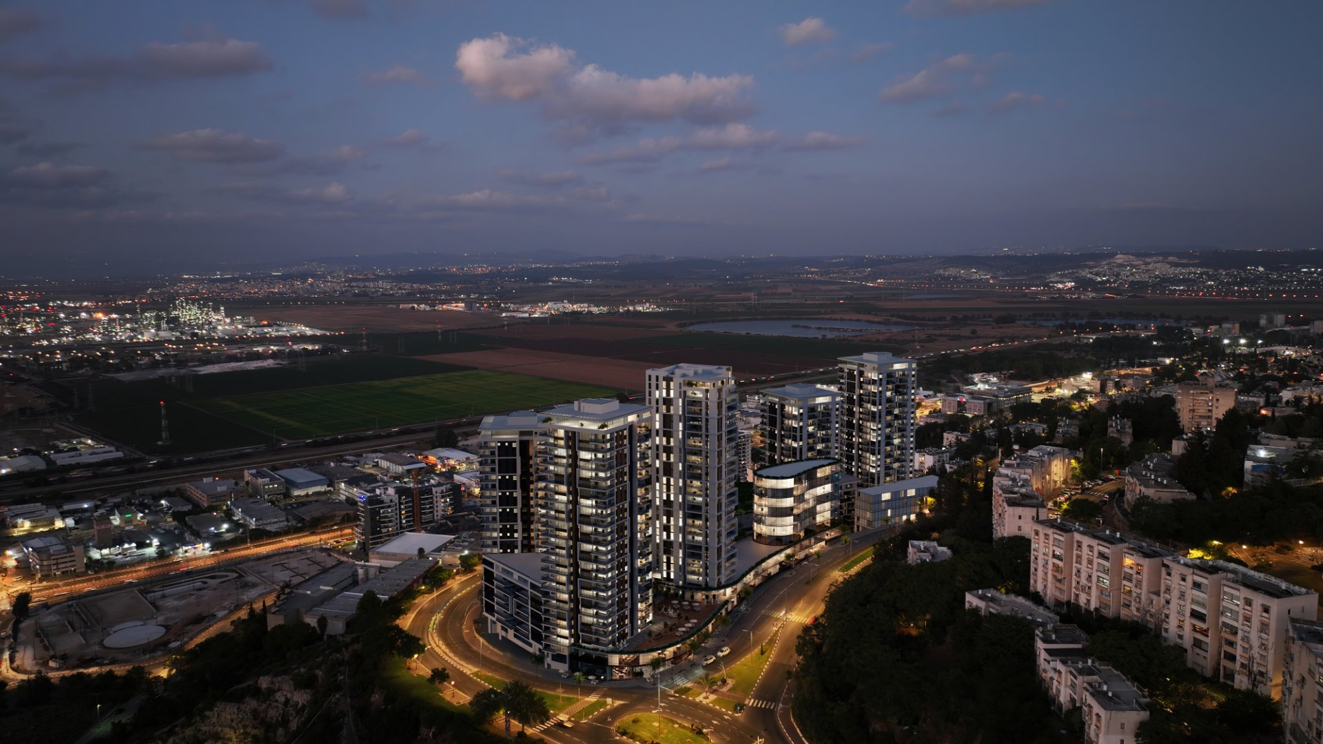 Photograph of few Bulidings in Nesher project at night