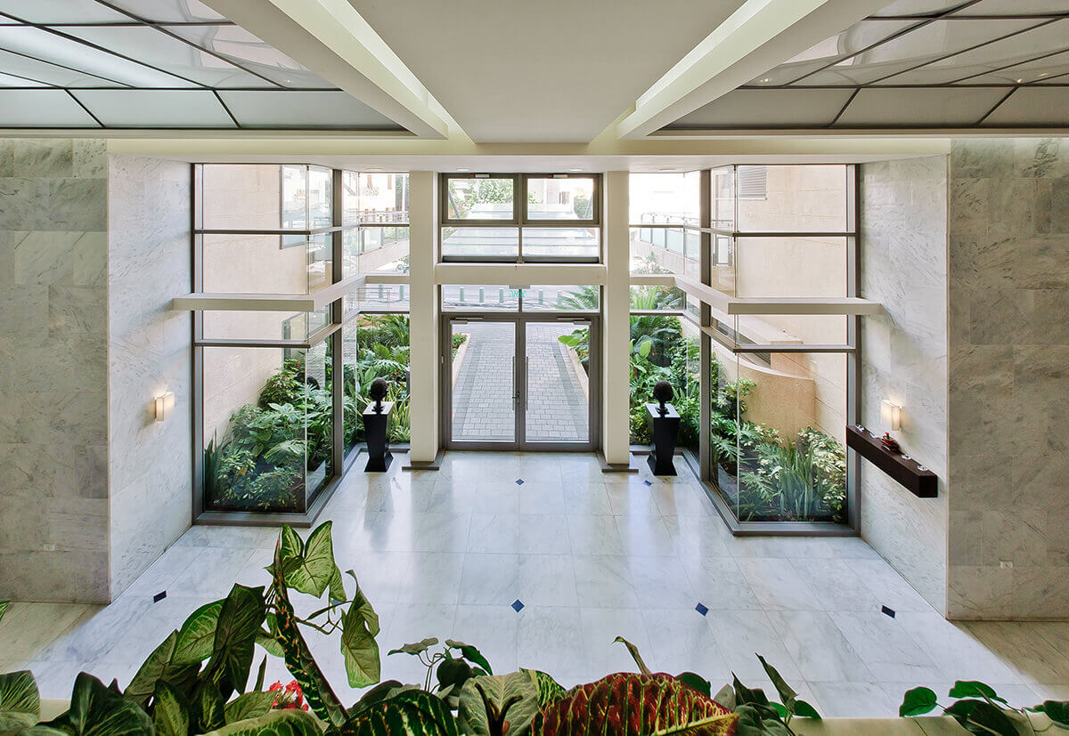 Photograph of the entrance lobby to the building in the Melchat Shinkin project in Tel Aviv